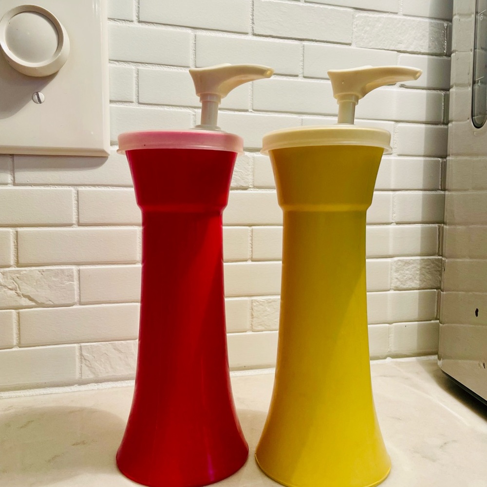 Tupperware Red and Yellow katchup and mustard Dispensers.